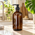 16 oz PurposeFill Castile soap in an amber glass pump bottle beside a kitchen sink in Bend, Oregon.